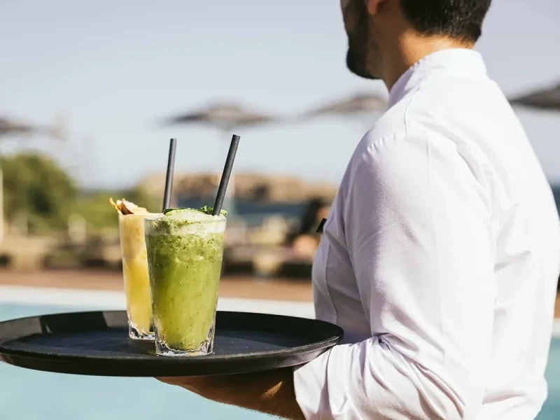 Refreshing drinks by the pool at Pool Hangout bar in Martinhal Sagres